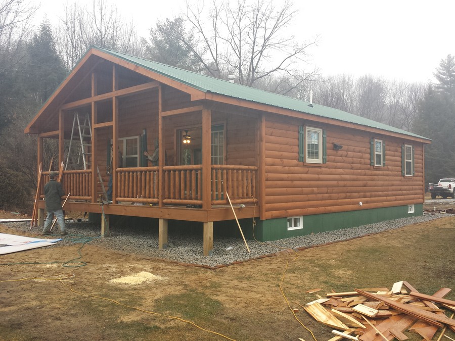 front of log sided home