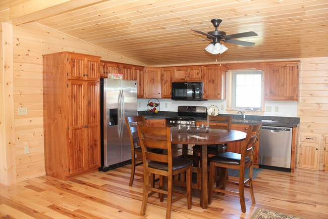 log sided home Holden Kitchen