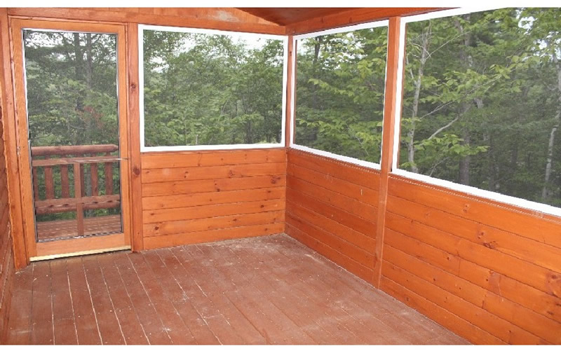 enclosed porch log home