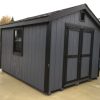 small gray storage barn